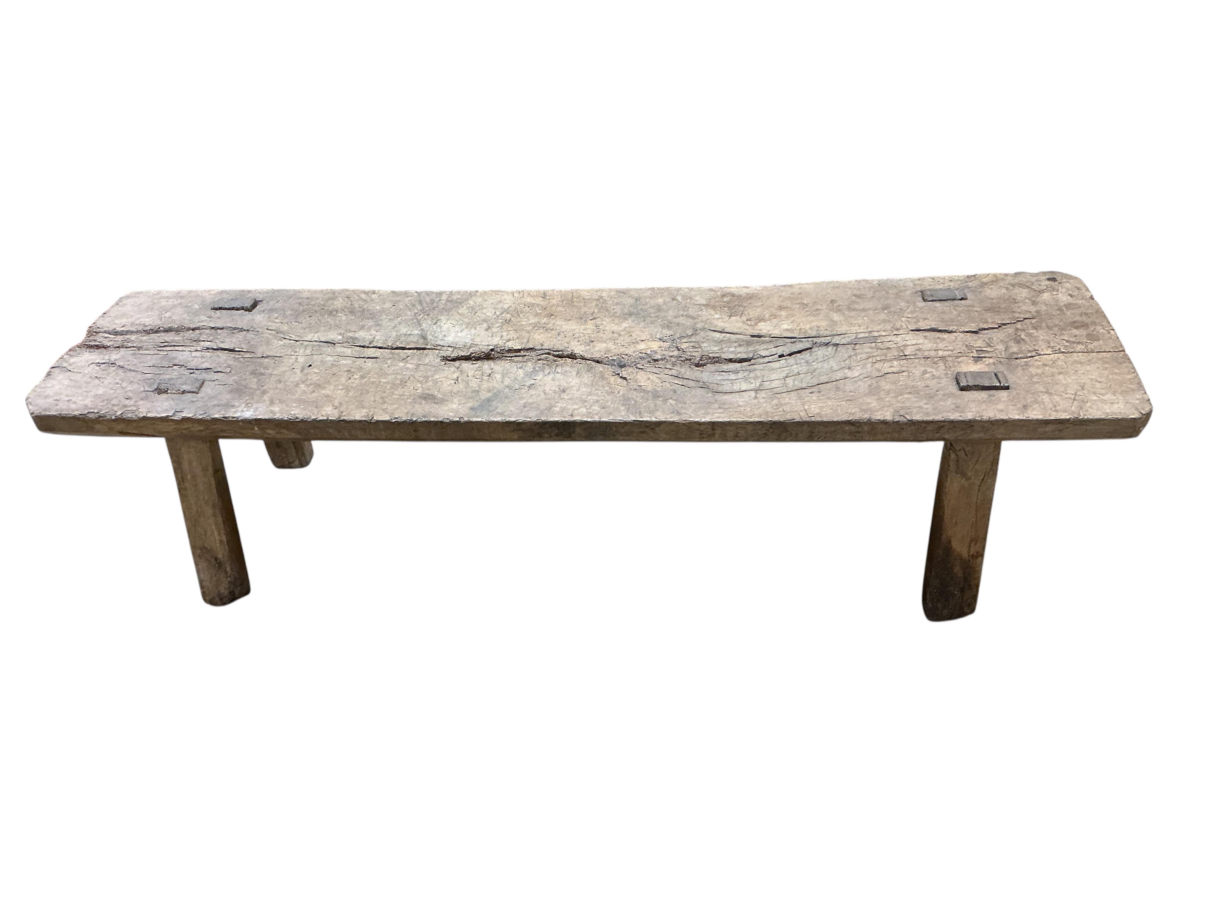 An 18th century oak bench, width 180cm, depth 45cm, height 43cm